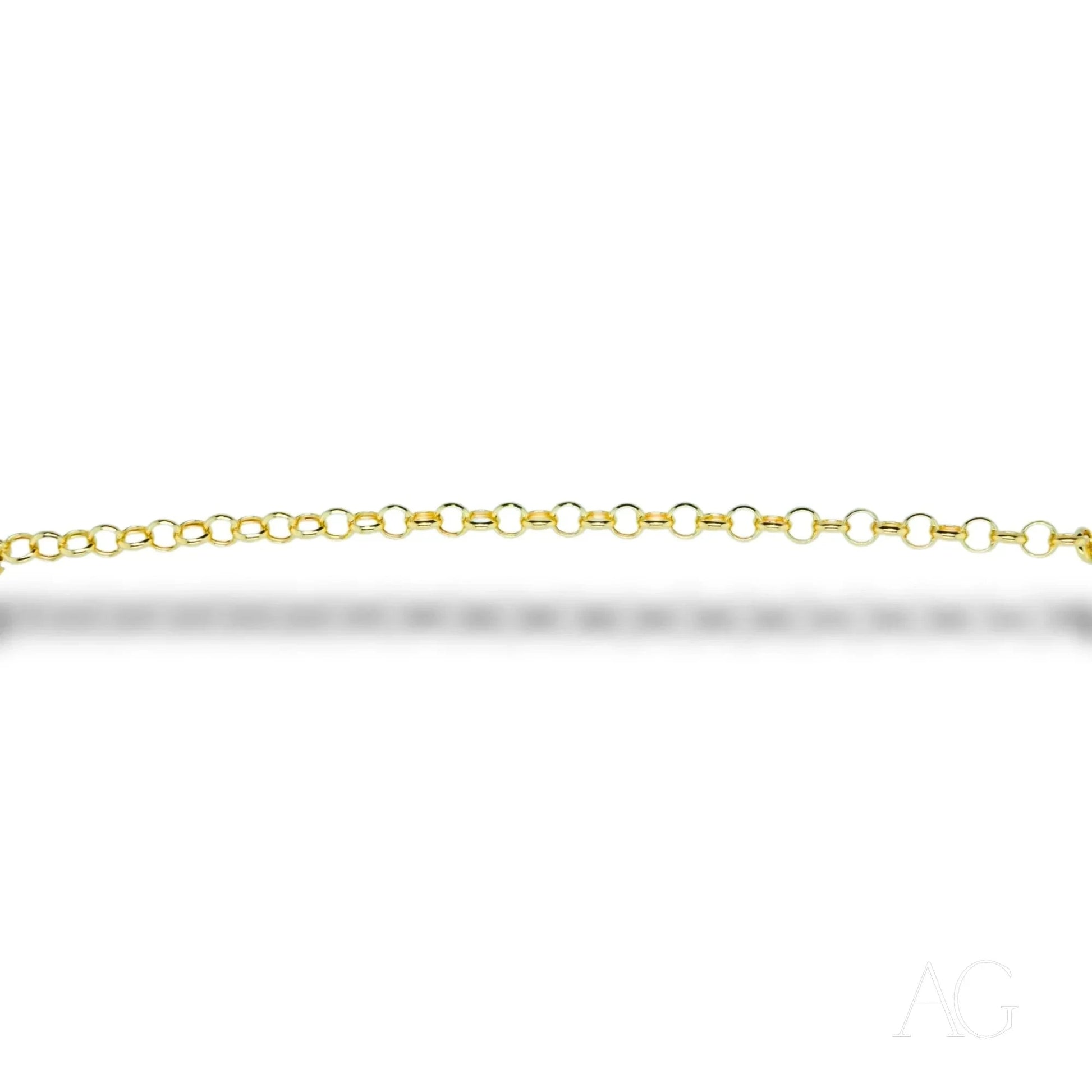 Gold chain necklace with small circular links showcased with Timeless 18k Gold Heart Bracelet