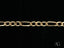 Gold-colored figaro bracelet with alternating long and short links in 18k gold