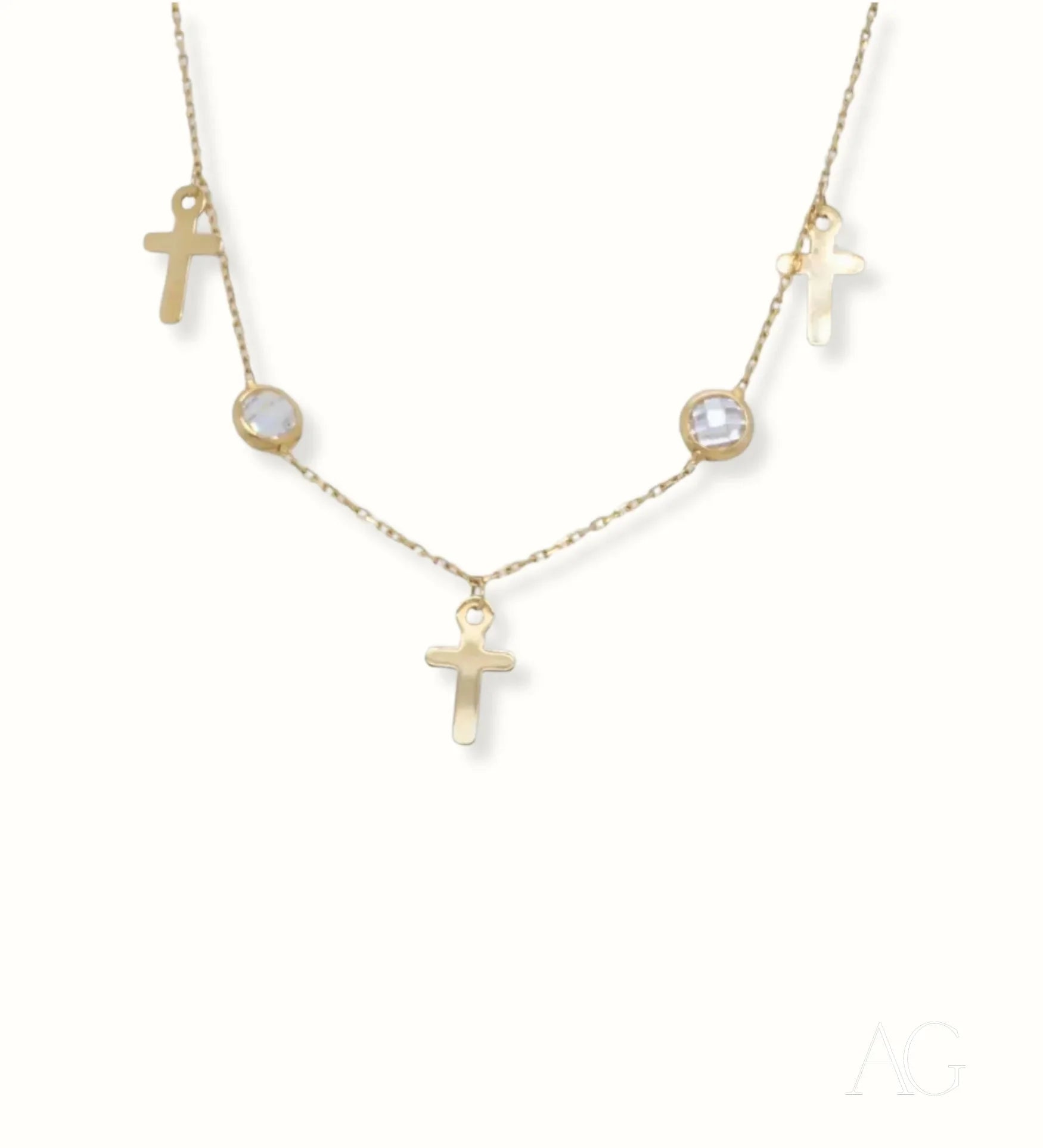 Delicate gold jewelry with ankh symbols and gemstone accents on 18k charms anklet