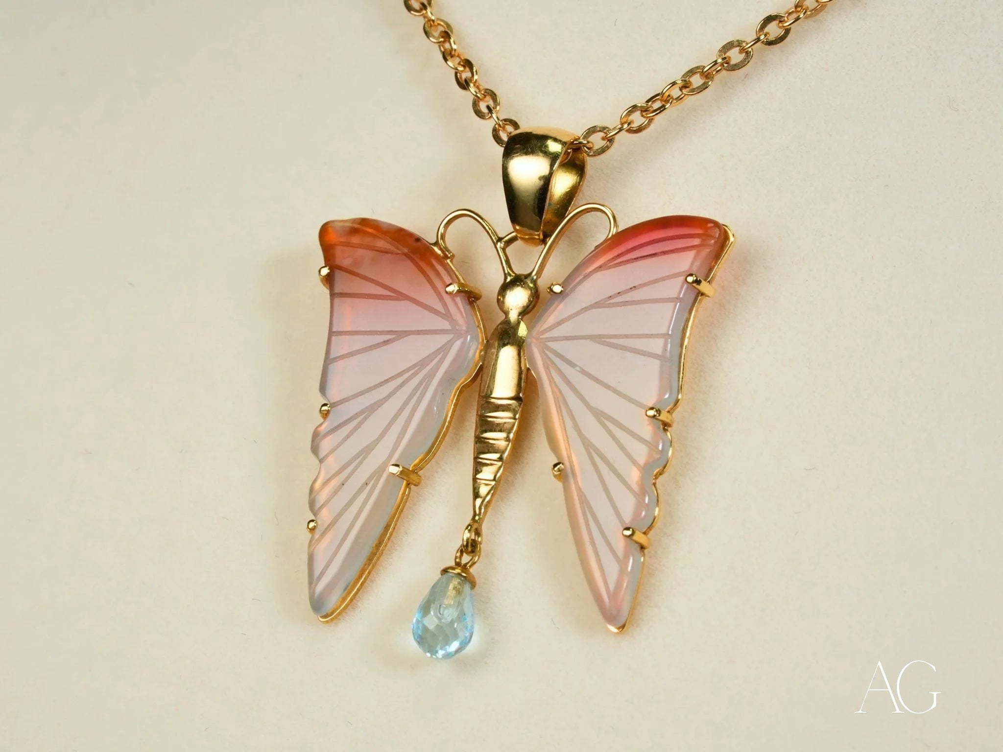 Delicate Butterfly Bliss Pendant with Pink Wings and Topaz Gemstones on 18k Gold Chain