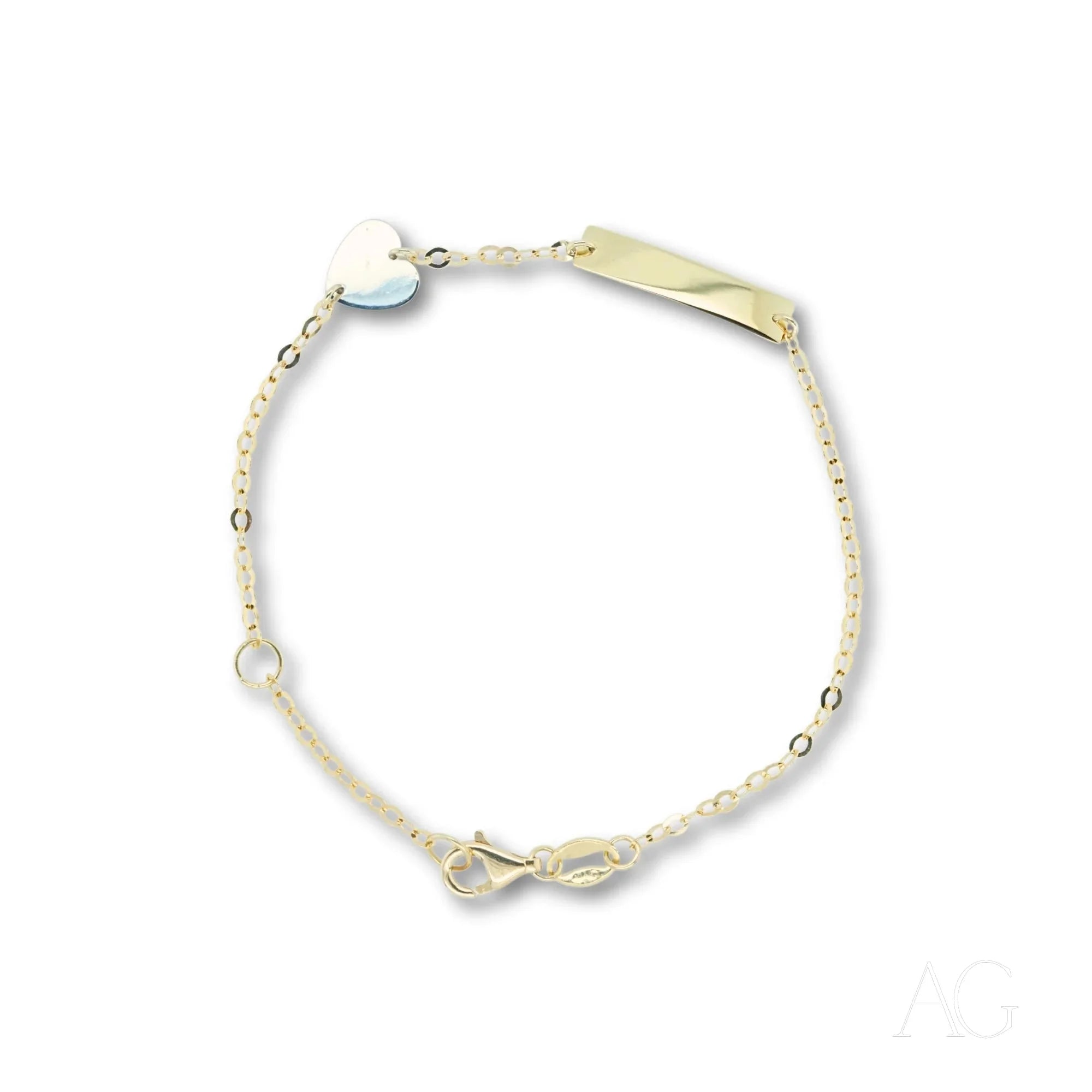 Children’s ID bracelet in yellow gold featuring a white gold heart motif and delicate beads