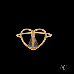 Gold heart-shaped ring with Nossa Senhora figure and blue gemstones in 18k gold