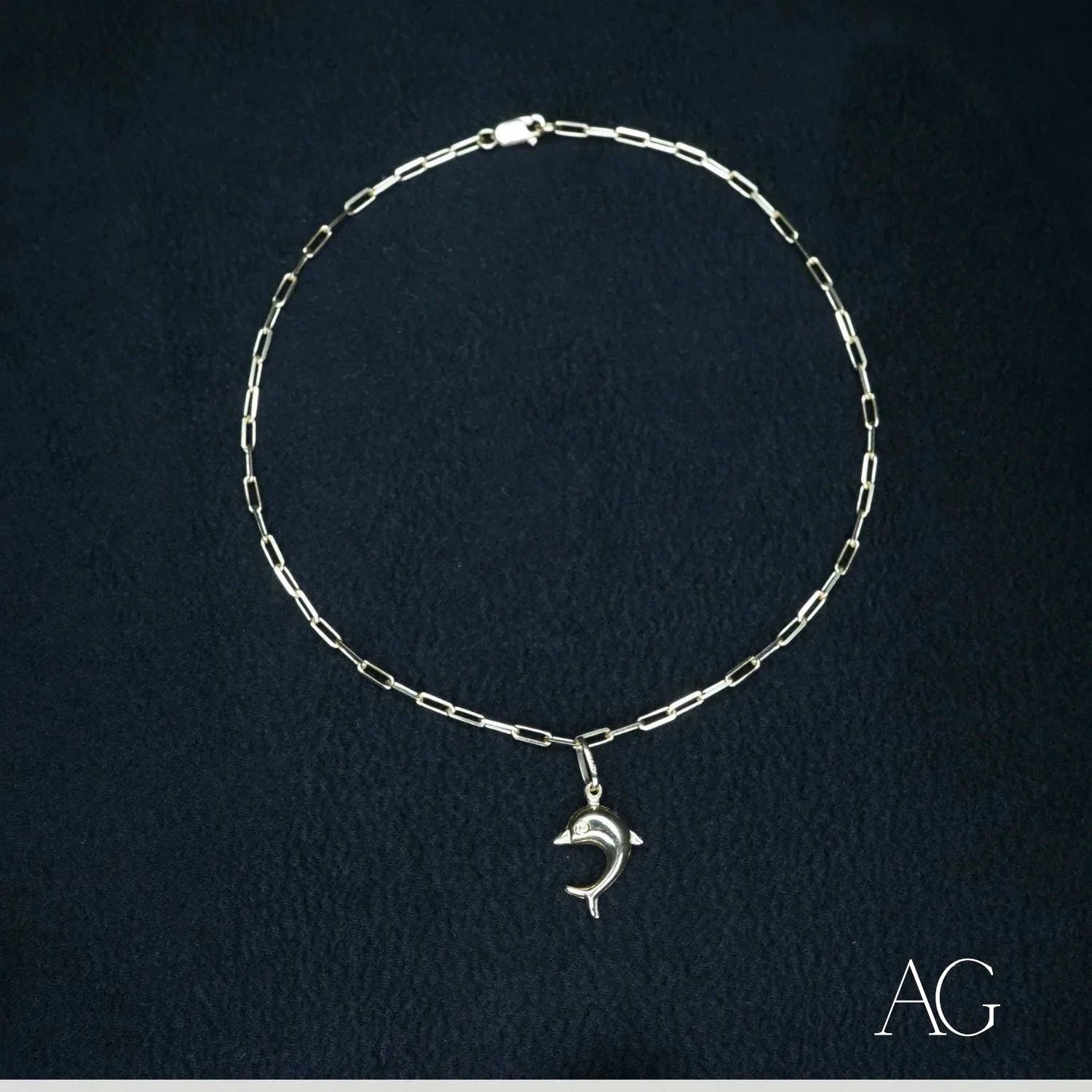 Silver chain necklace featuring a dolphin pendant from the 18k Gold Anklet collection