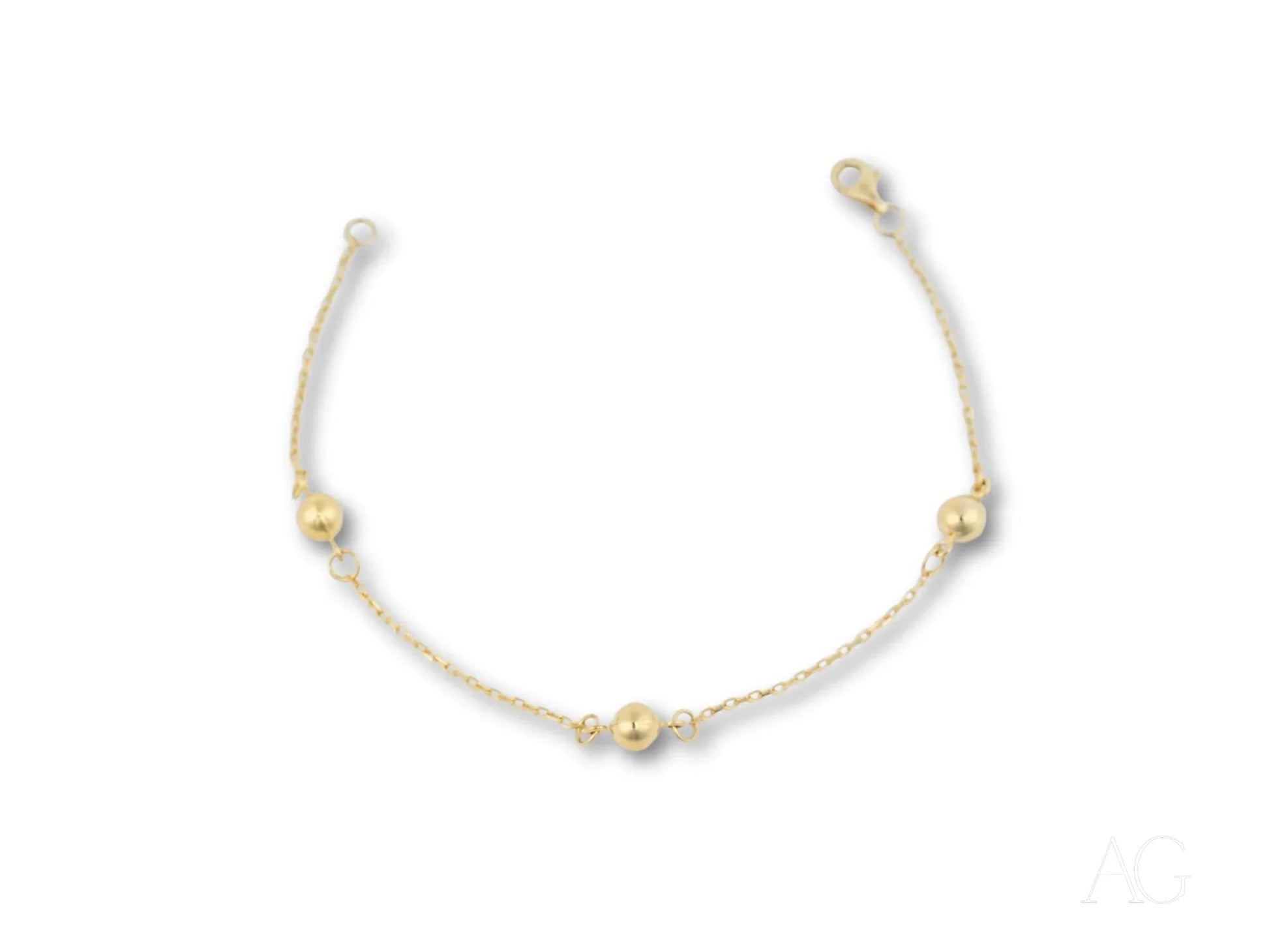 Elegance and simplicity 18k gold bracelet with polished gold spheres and pearls