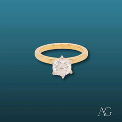 Elegant 18k cz gold engagement ring featuring a solitaire diamond in a six-prong setting