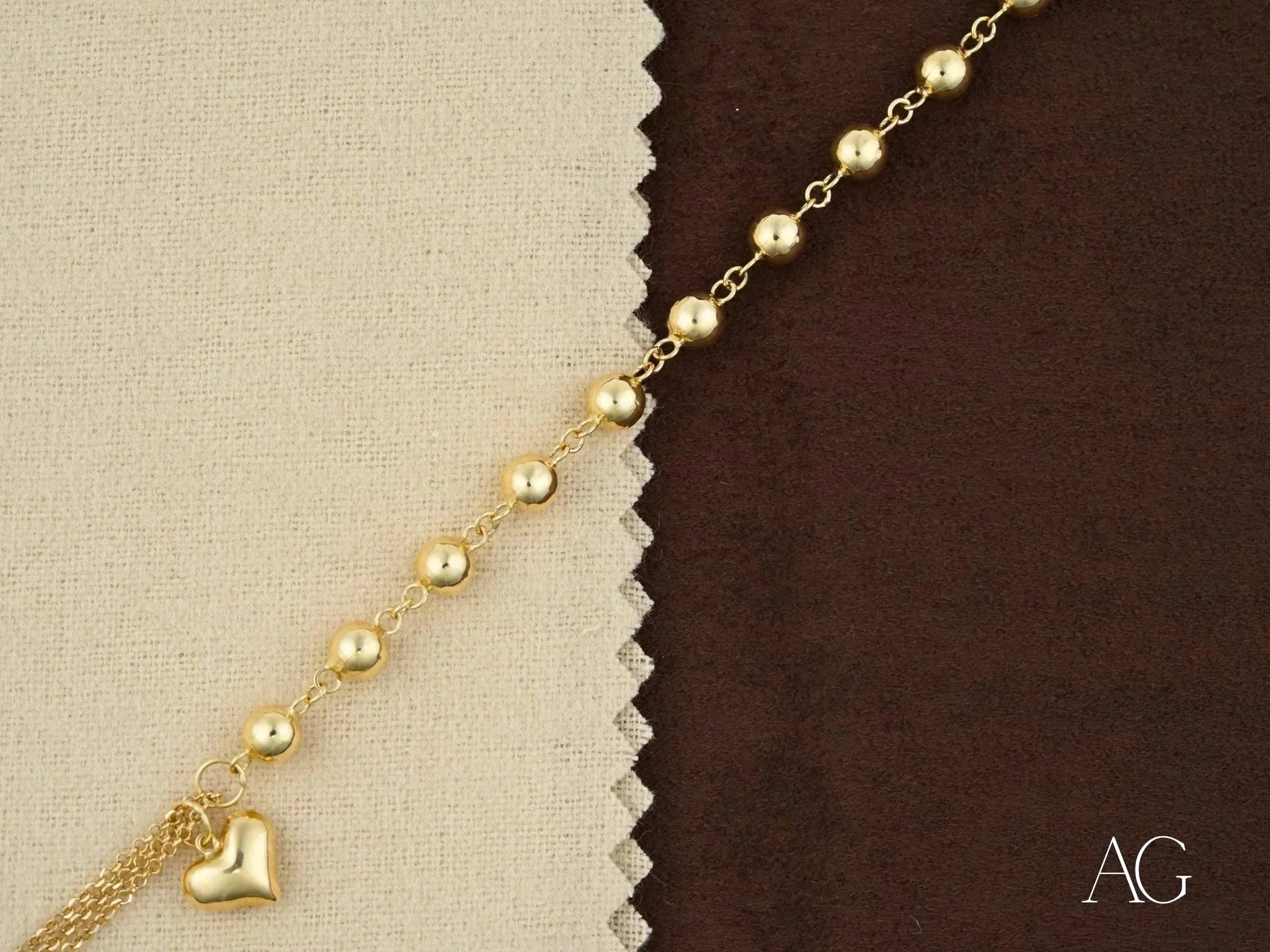 Elegant 18k Gold Bracelet with Heart Motif and Polished Gold Beads for stylish accessories