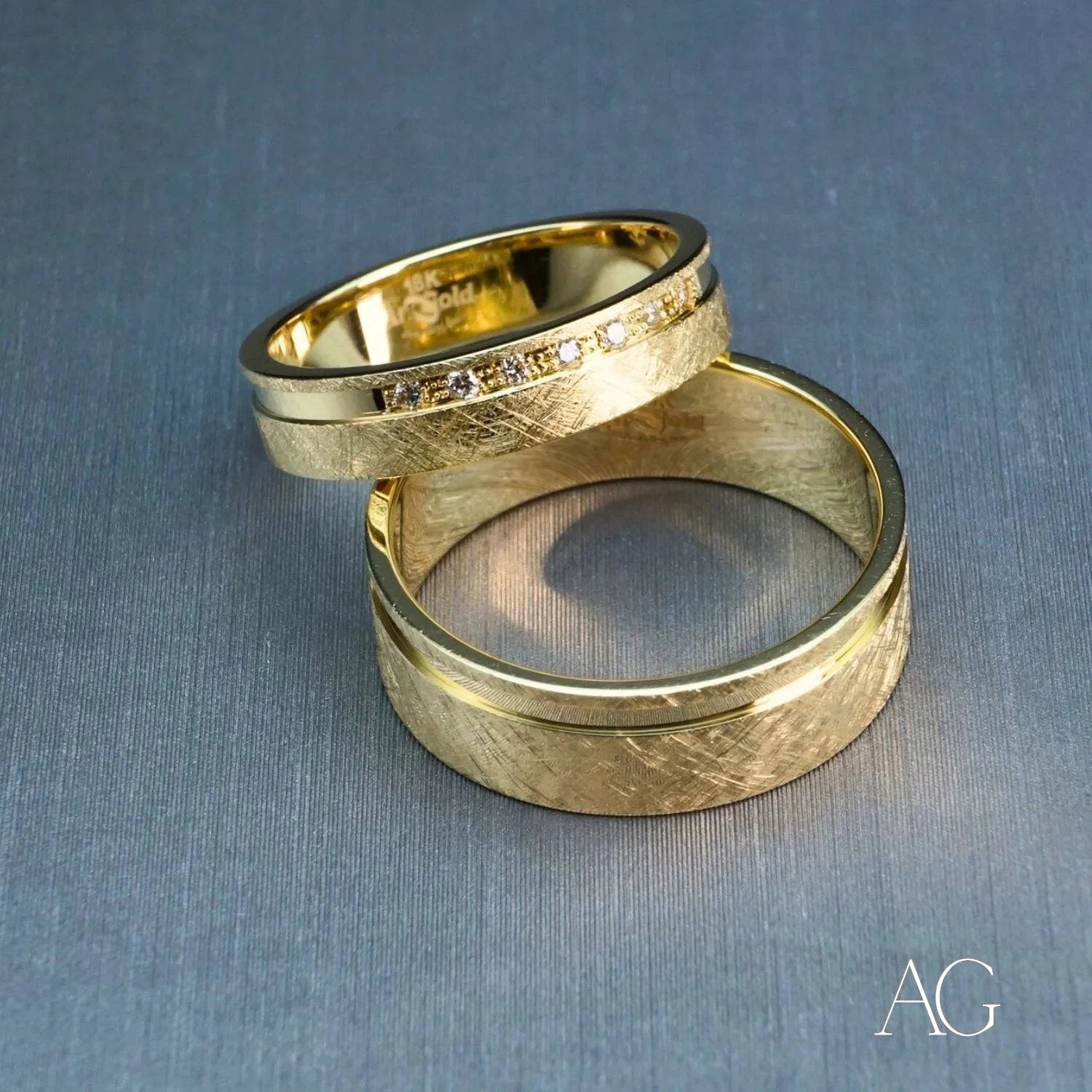 Pair of textured gold wedding bands featured in Elegant 18k Gold Diamond Wedding Band for Her