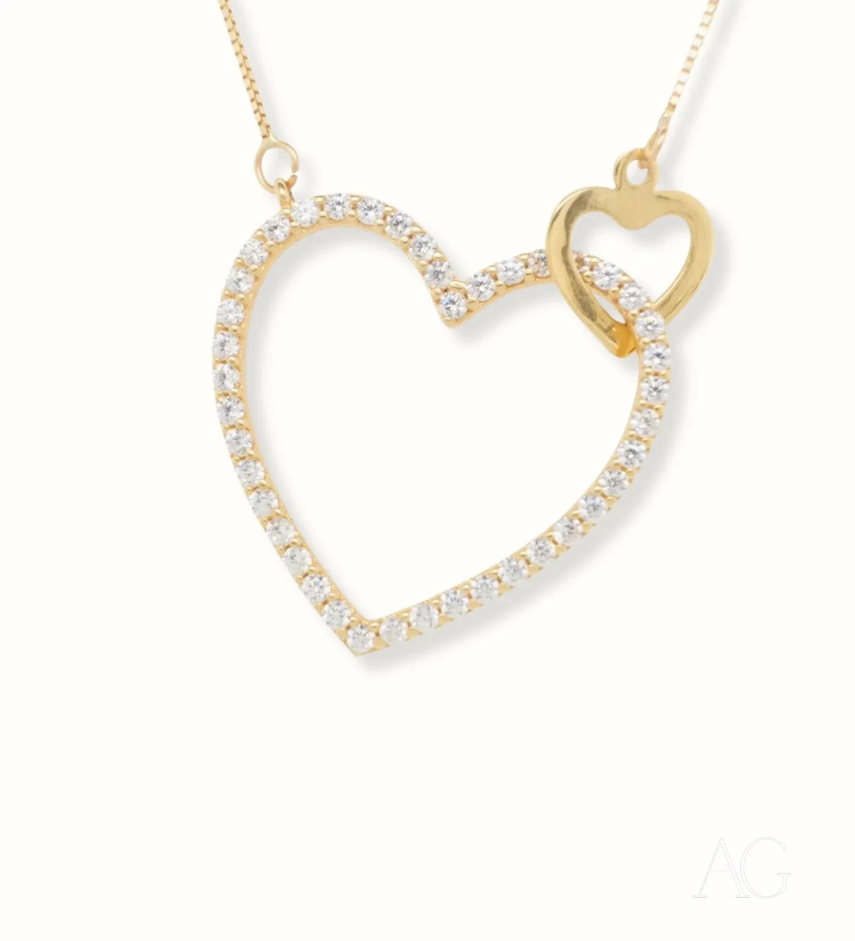 Elegant 18k Gold Heart Necklace featuring small diamonds in beautiful gold jewelry design