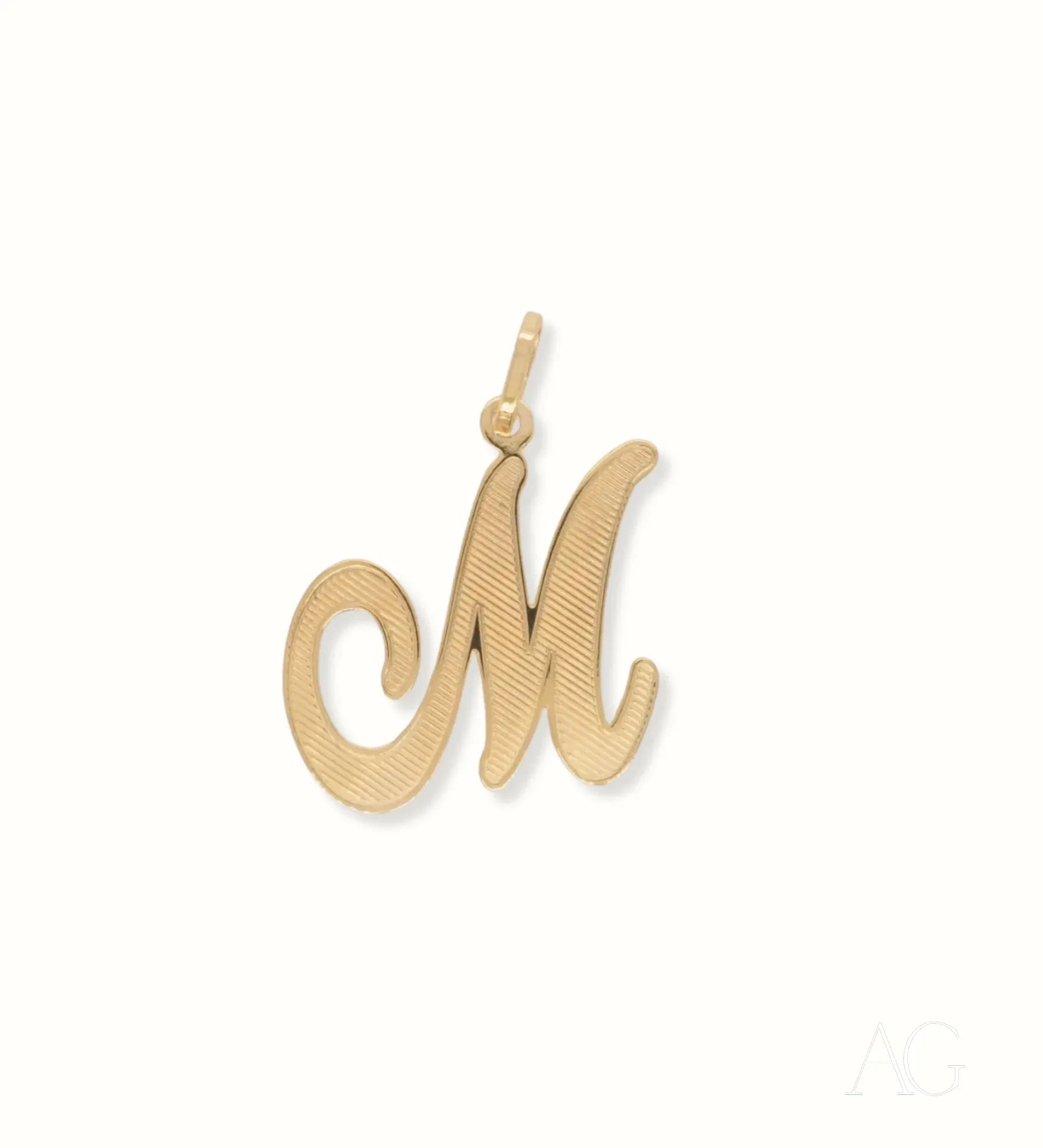 Elegant 18k Gold Letter M Pendant featuring a refined gold-colored cursive design