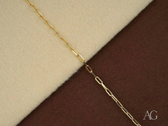 Delicate solid 18k gold chain necklace featuring elongated links for timeless sophistication