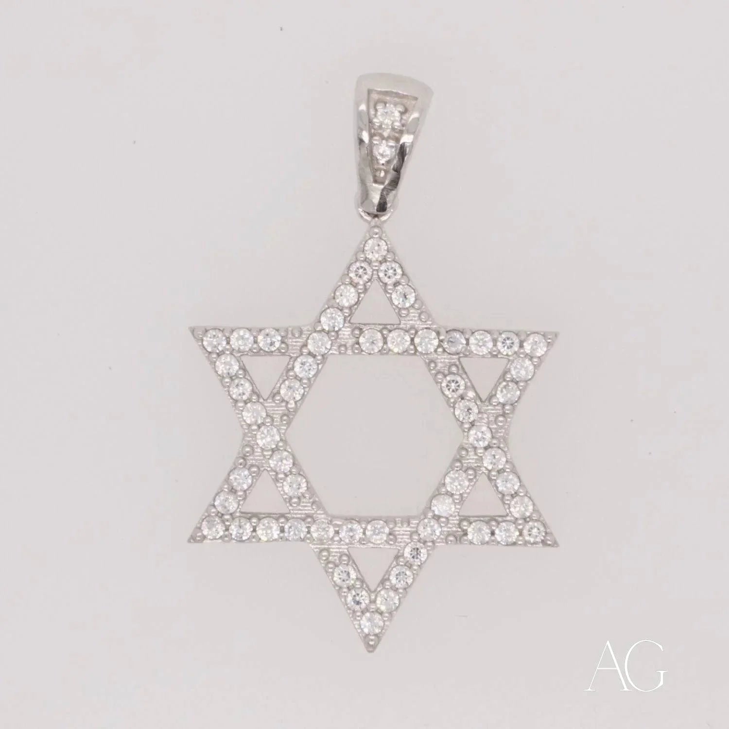 Elegant 18k White Gold Star of David pendant adorned with diamonds and CZ accents