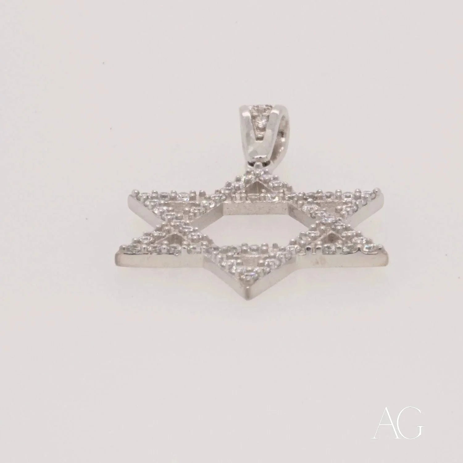 Elegant 18k White Gold Star of David pendant with diamond accents and CZ stones