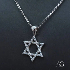 Star of David pendant necklace in 18k white gold with diamond accents