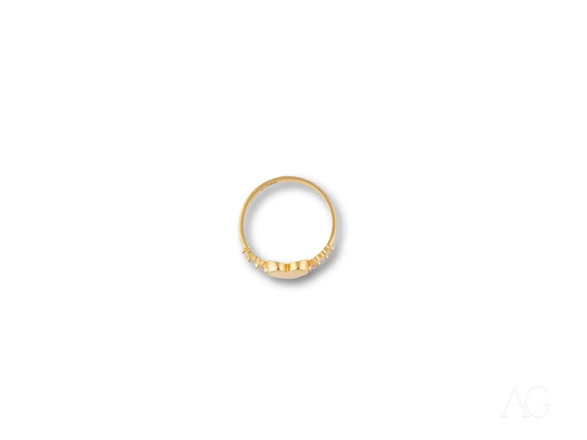 Elegant 18k yellow gold heart ring with small diamonds along the bottom edge