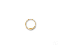 Elegant 18k yellow gold heart ring with small diamonds along the bottom edge