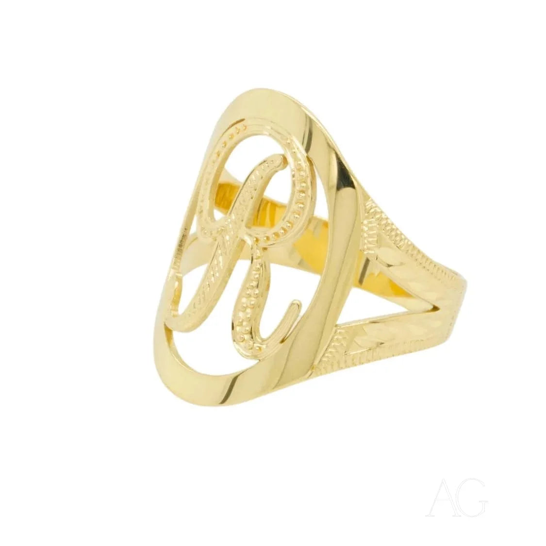 Gold-colored initial letter ring with intricate swirling design, art gold elegance