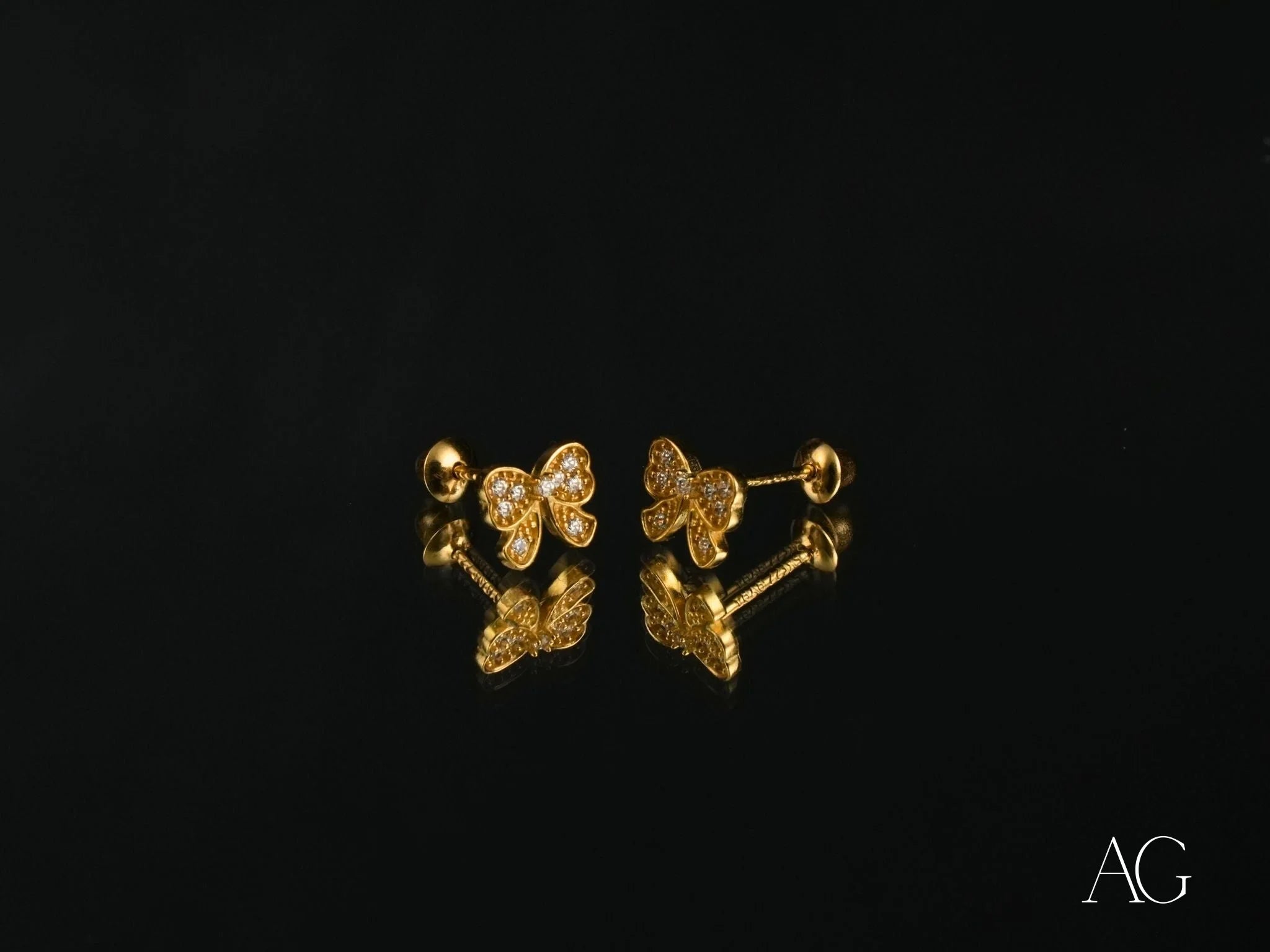 Elegant Bow – 18K Gold CZ Bow Earrings, a stunning piece of art gold jewelry
