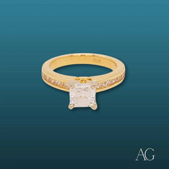 Gold engagement ring featuring a princess-cut diamond, part of an 18k cz solitaire collection