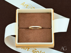 Elegant 18k gold ring with diamonds, beautifully presented in a jewelry box