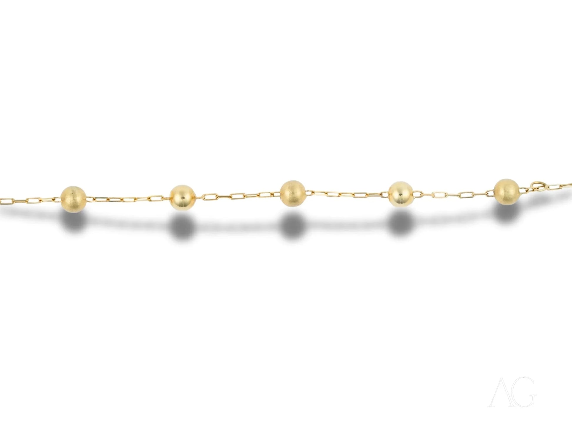 Elegant 18k gold bracelet with spring ring clasp and pearl-like beads design