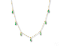 Elegant 18k Gold Emerald Necklace featuring stunning marquise-cut emeralds and droplets