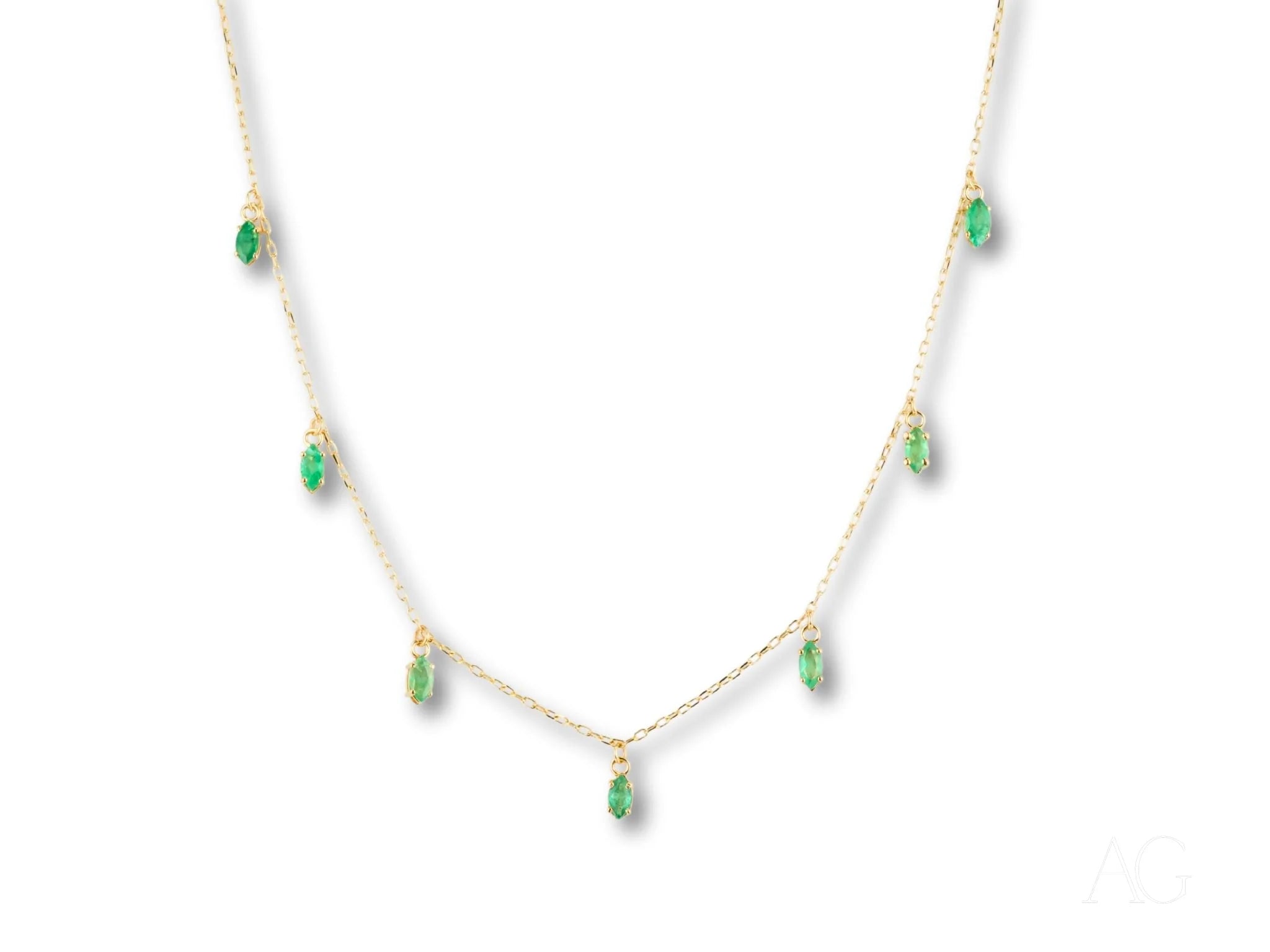 Elegant 18k Gold Emerald Necklace featuring stunning marquise-cut emeralds and droplets