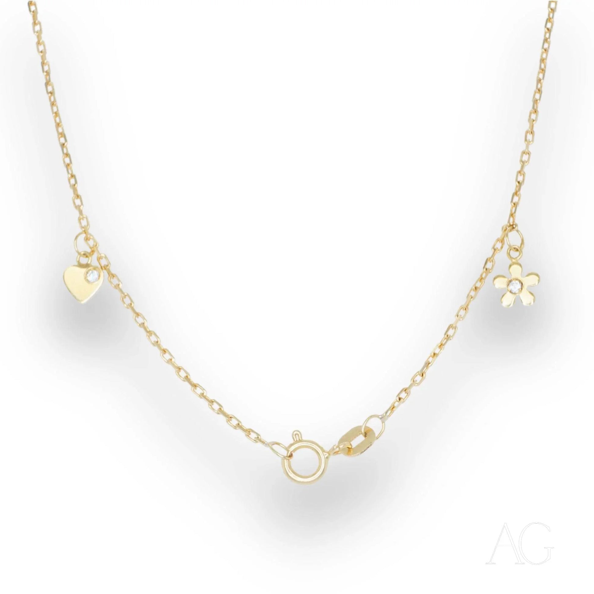 Delicate gold anklet with heart and flower charms, crafted in 18k gold