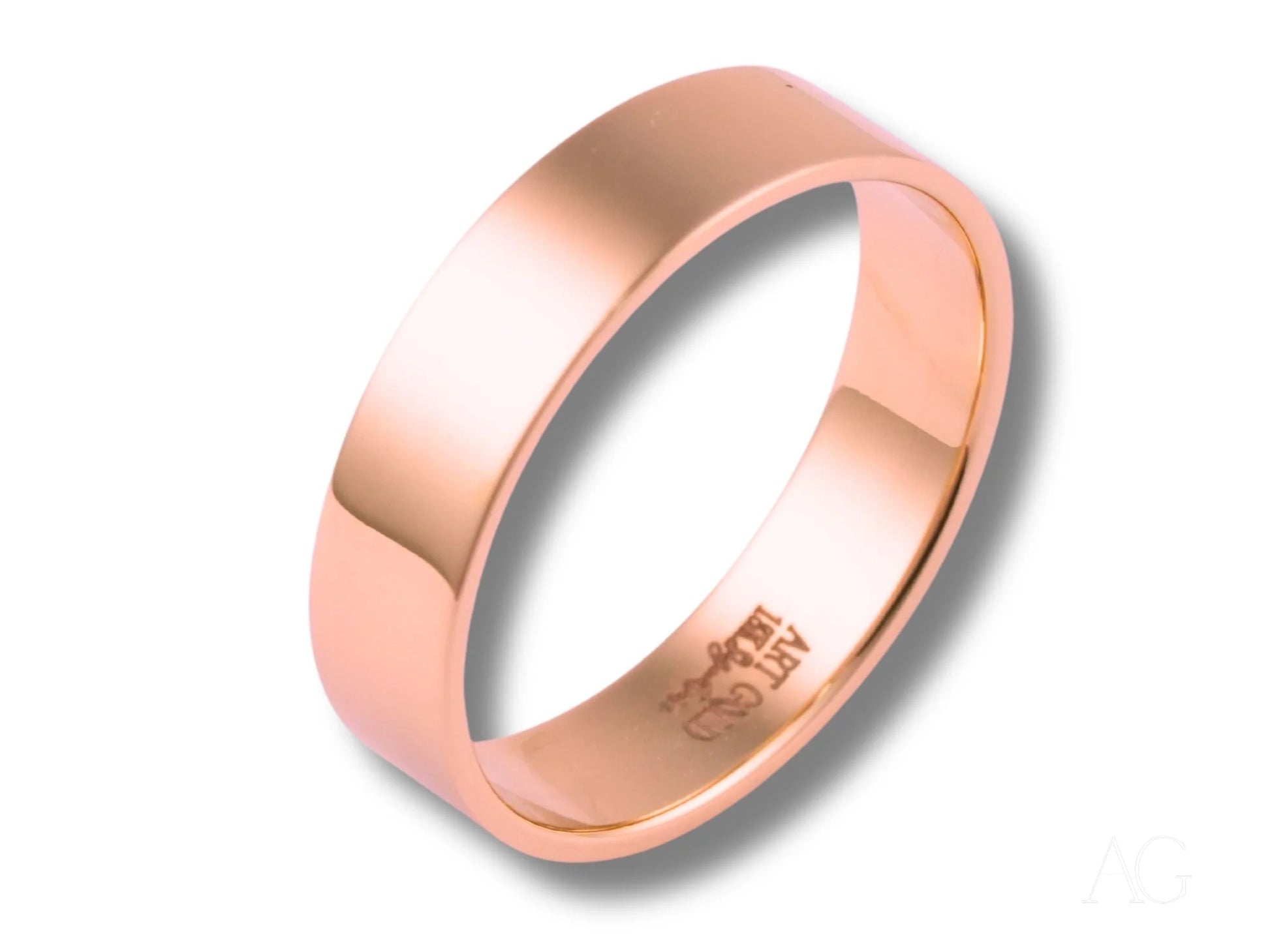 Rose gold wedding band from the Essence Collection, featuring minimalistic 18k gold design