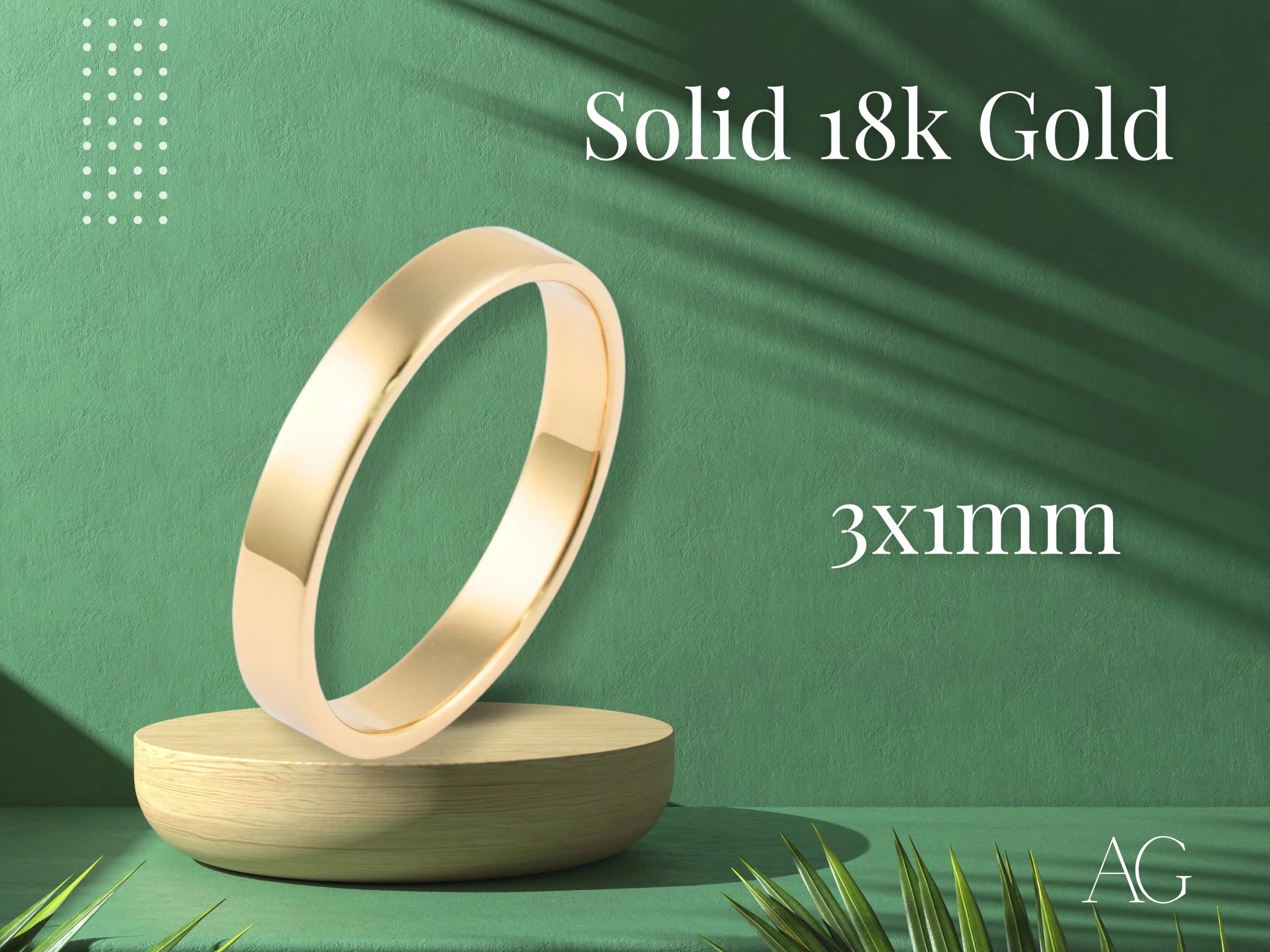 Gold ring displayed on a pedestal, showcasing a timeless minimalist design in solid gold