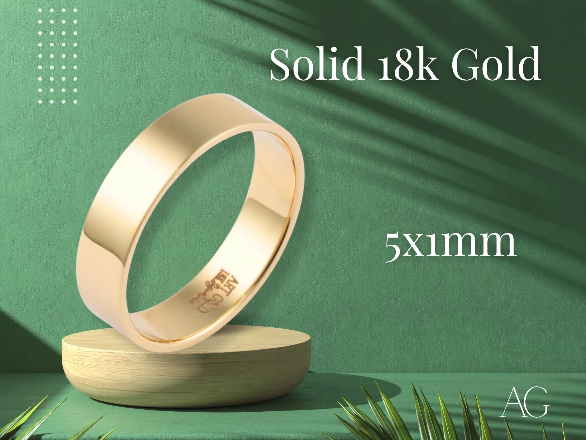 Timeless minimalist gold ring displayed elegantly on a curved pedestal