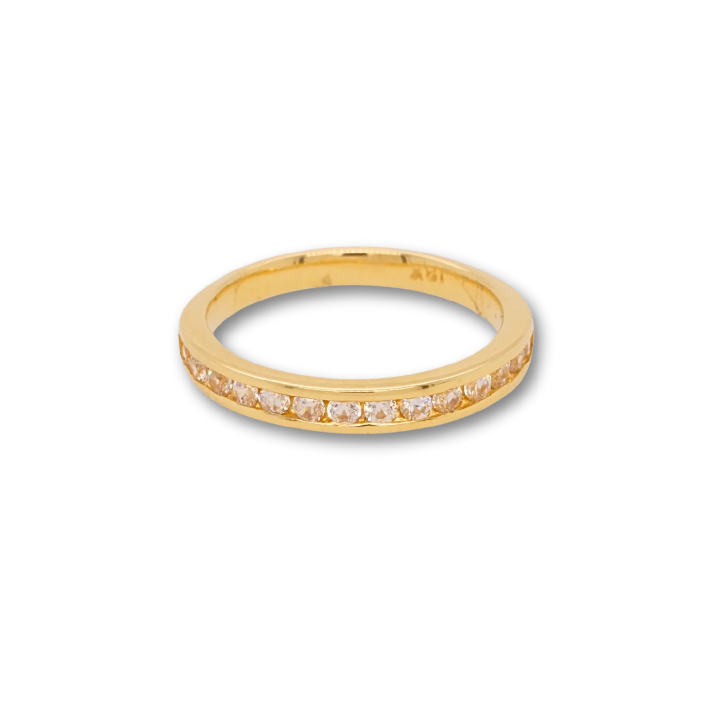 Essence of Radiance: The 18k Gold Ring Adorned with CZ