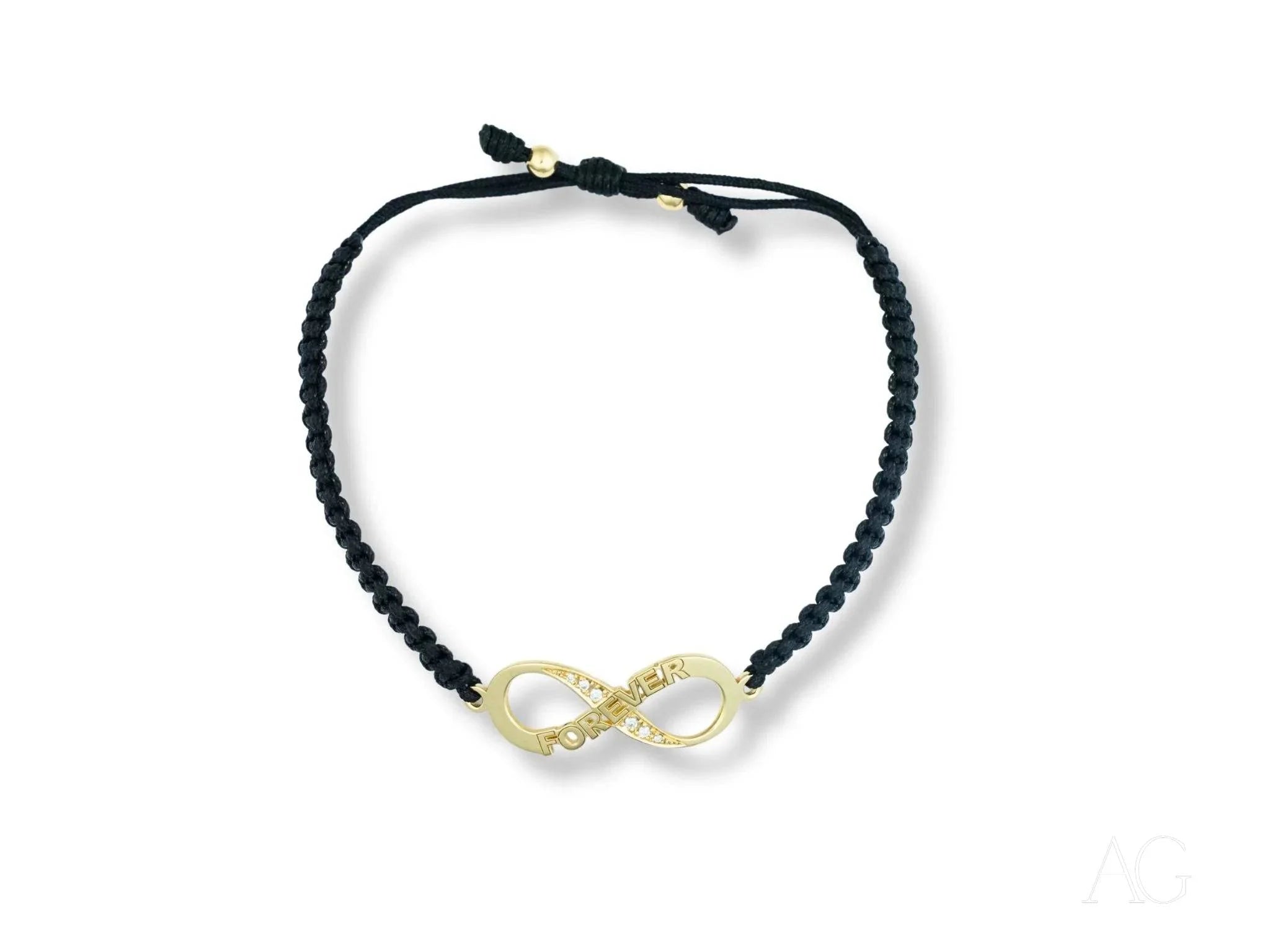 Black nylon band bracelet featuring an 18k gold infinity symbol charm