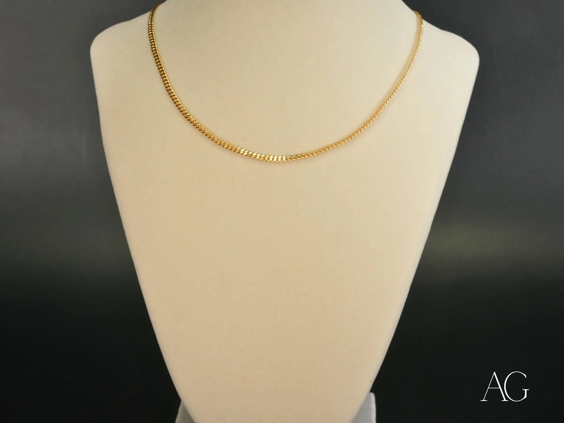 Eternal Prestige 18K Gold Figaro Chain necklace showcasing elegant design and luxury