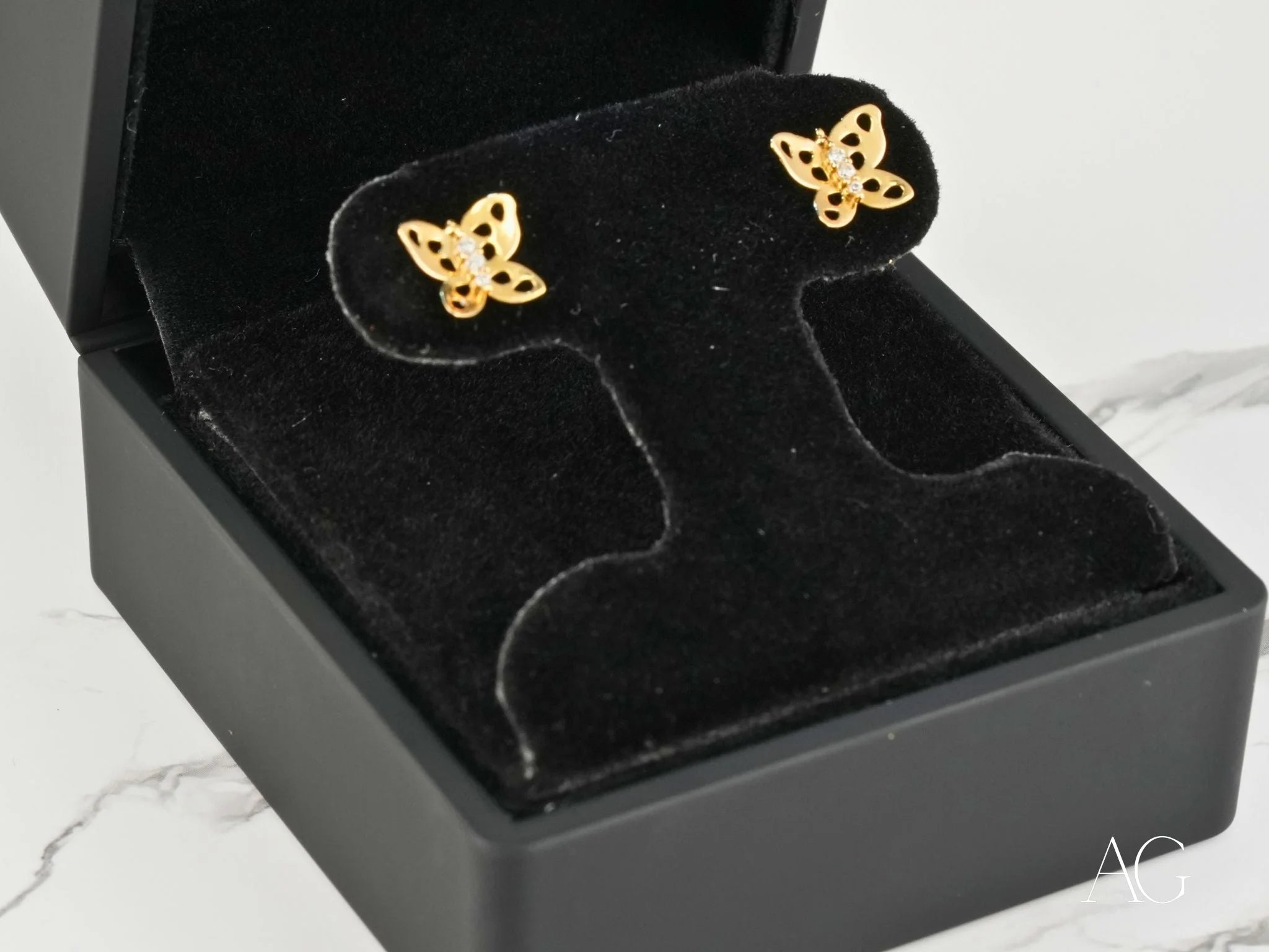 Ethereal Wings butterfly earrings in 18K gold with diamond accents for elegant style