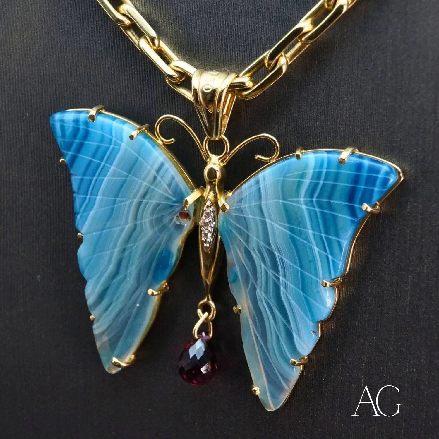 Butterfly pendant necklace with blue agate wings and 18k yellow gold accents