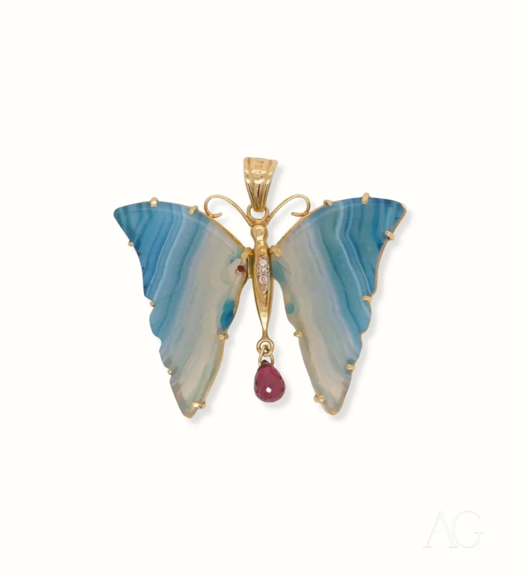 Butterfly pendant in 18k yellow gold with blue agate wings and a red gemstone