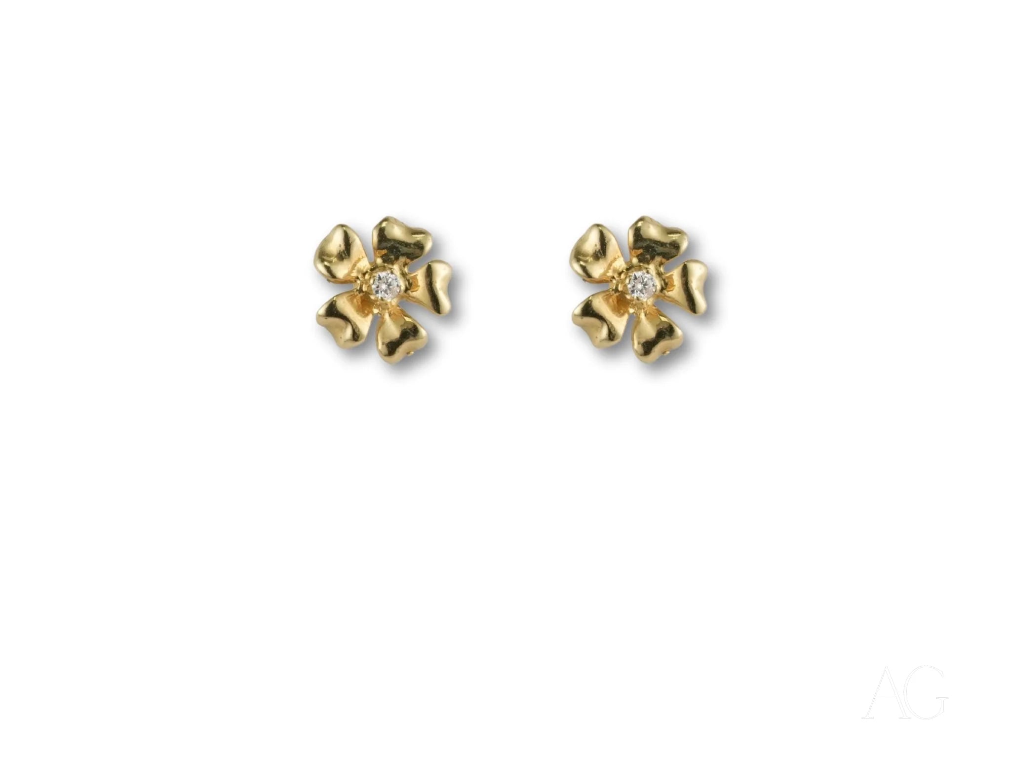Pair of Floral Elegance earrings featuring 18k gold and 0.06ct diamond flower studs