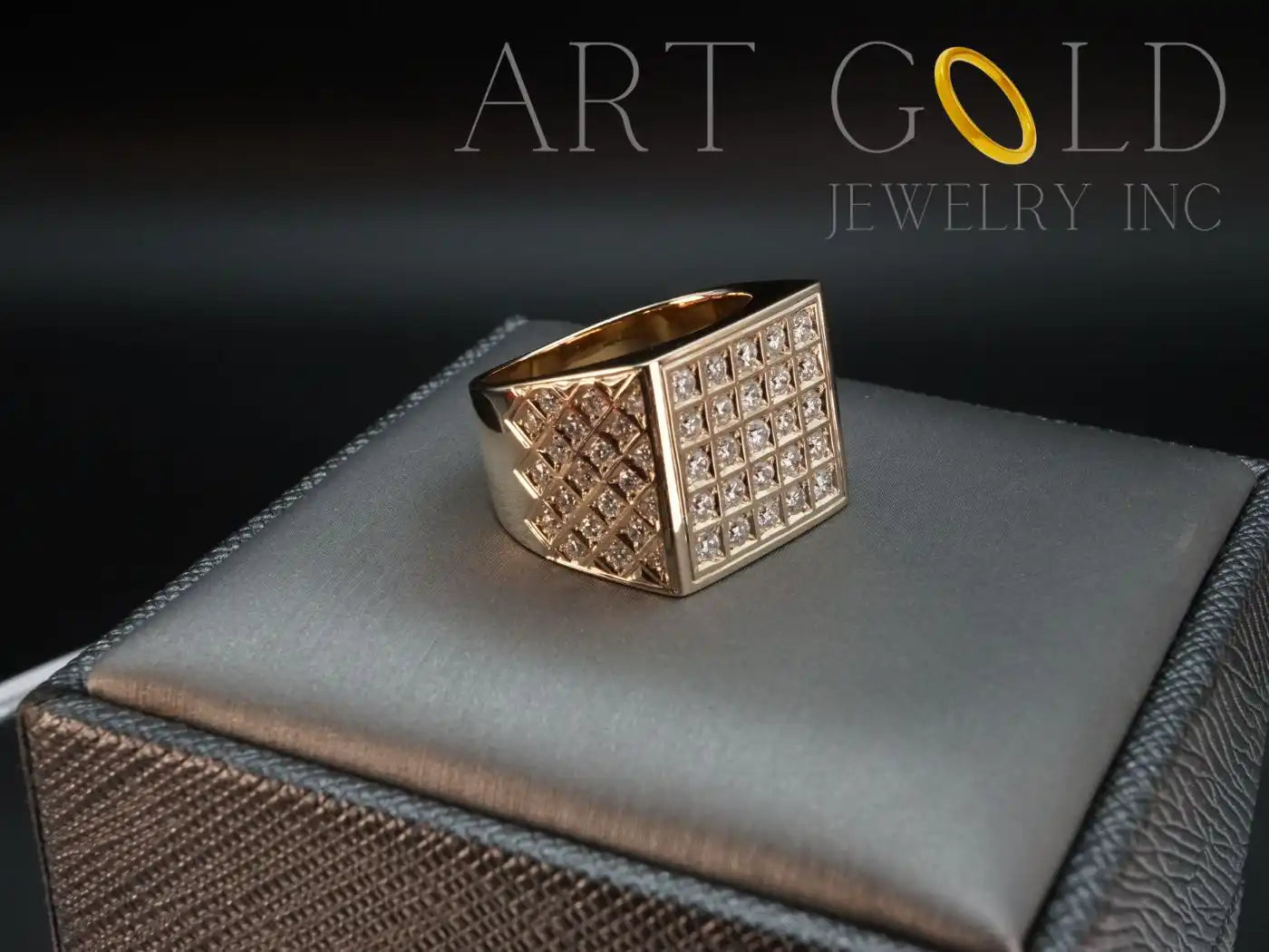 Gold ring with square-shaped top covered in diamond pavé stones.