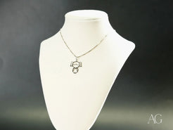 Silver necklace featuring a Golden Doll pendant in 18k Yellow or White Gold