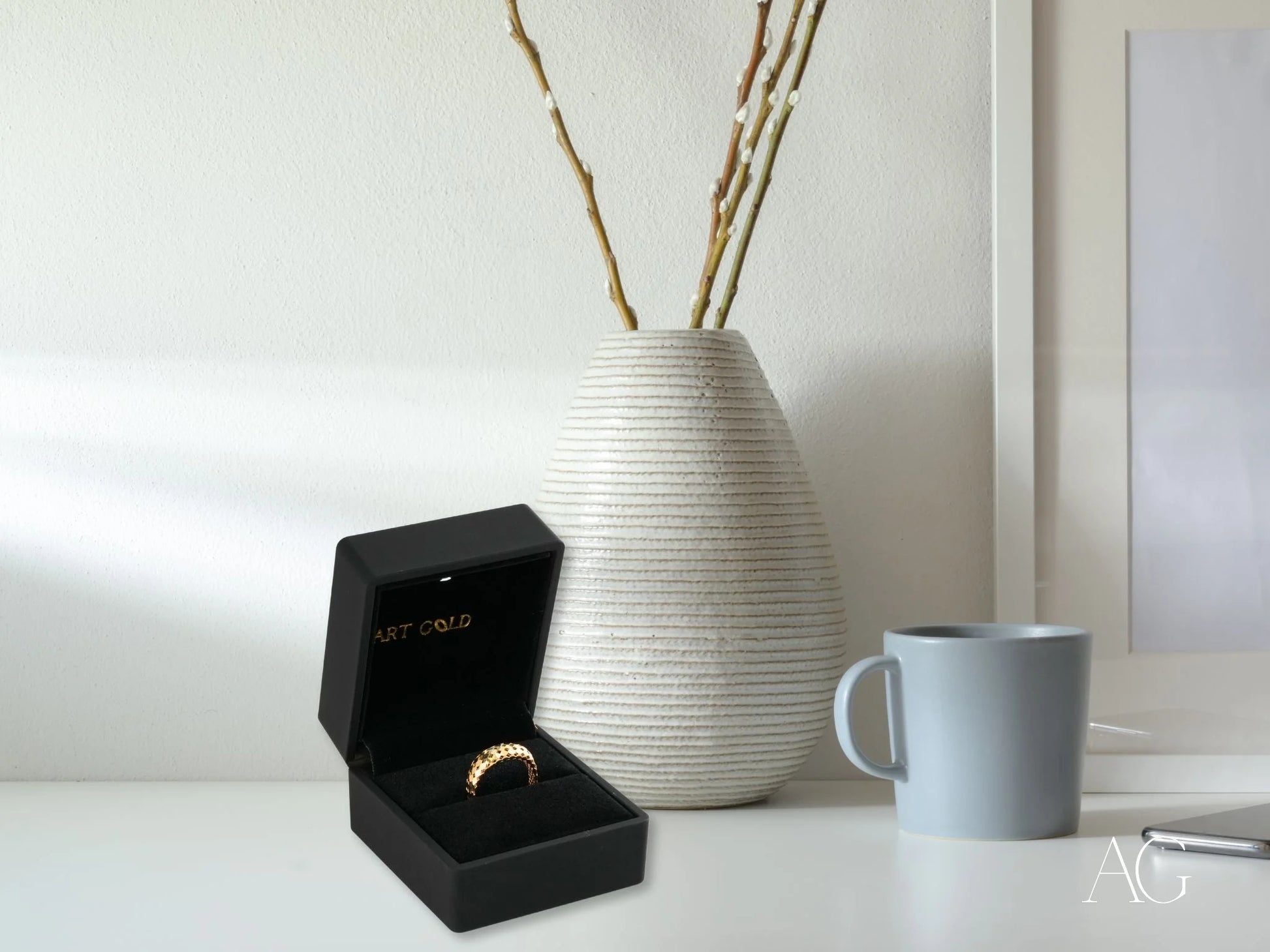 Gold ring in black jewelry box featuring the Golden Mesh Elegance design in 18k gold