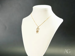 Gold pendant necklace on white bust featuring 18k Gold Golden Heart Heart Boy design