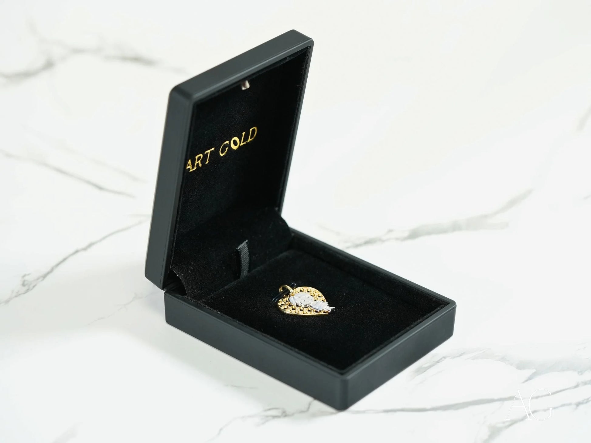 Gold ring with diamonds in a black jewelry box for the 18k Gold Golden Elegance Doll Pendant