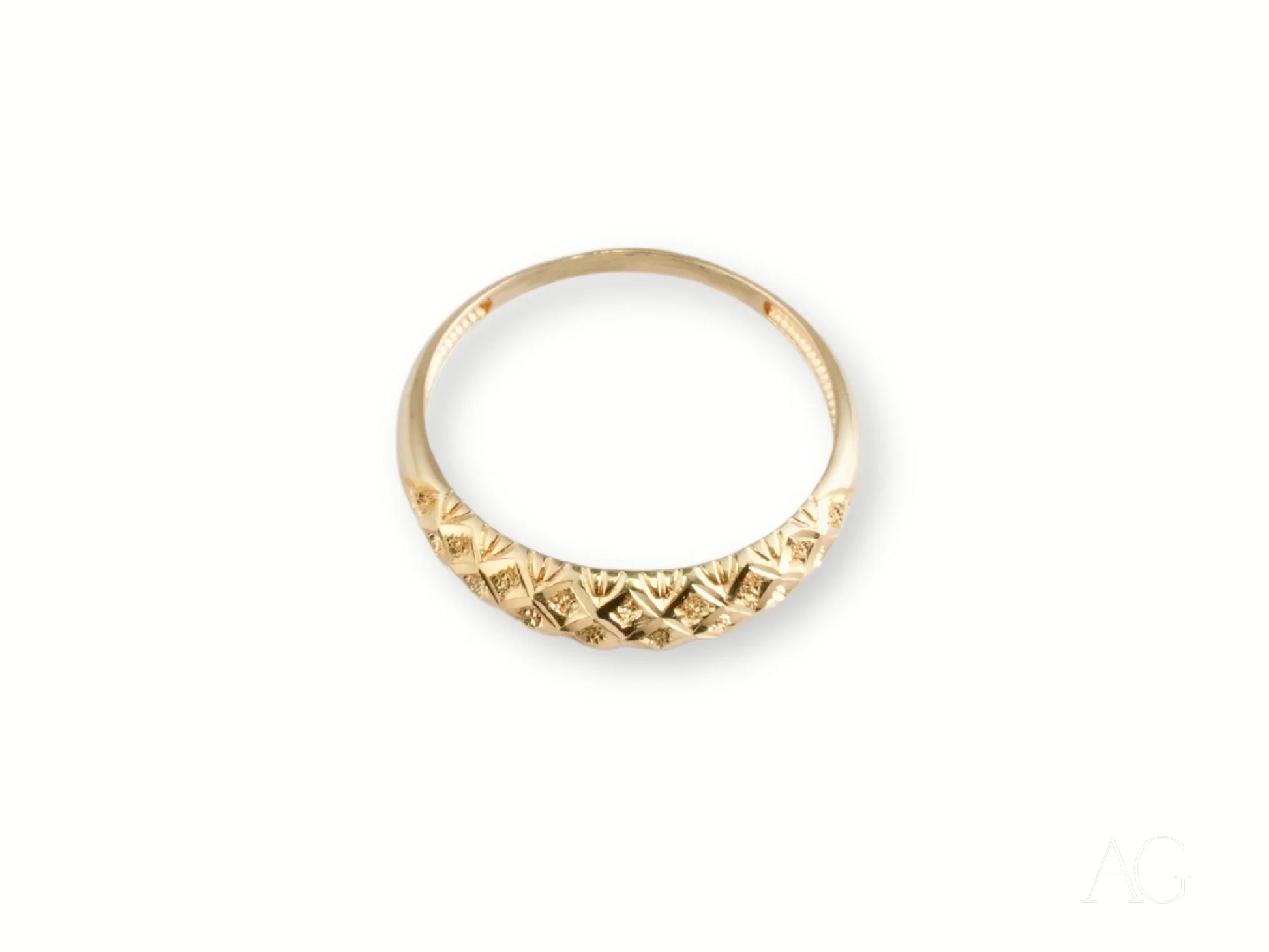 Gold ring with textured zigzag pattern design from the Golden Grace 18k Aparador Ring collection