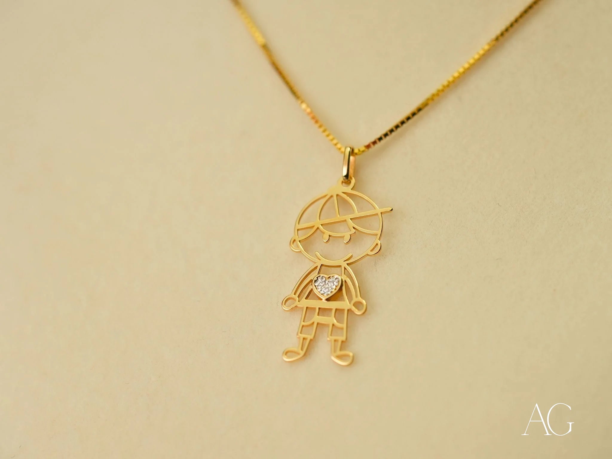 18k Gold Golden Heart Pendant featuring a stick figure boy with an umbrella