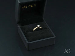 Diamond solitaire engagement ring in black box for Golden Promise 18k Gold Jewelry