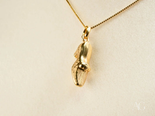 Gold violin-shaped pendant on a delicate chain necklace from Golden Steps Shoes Pendant