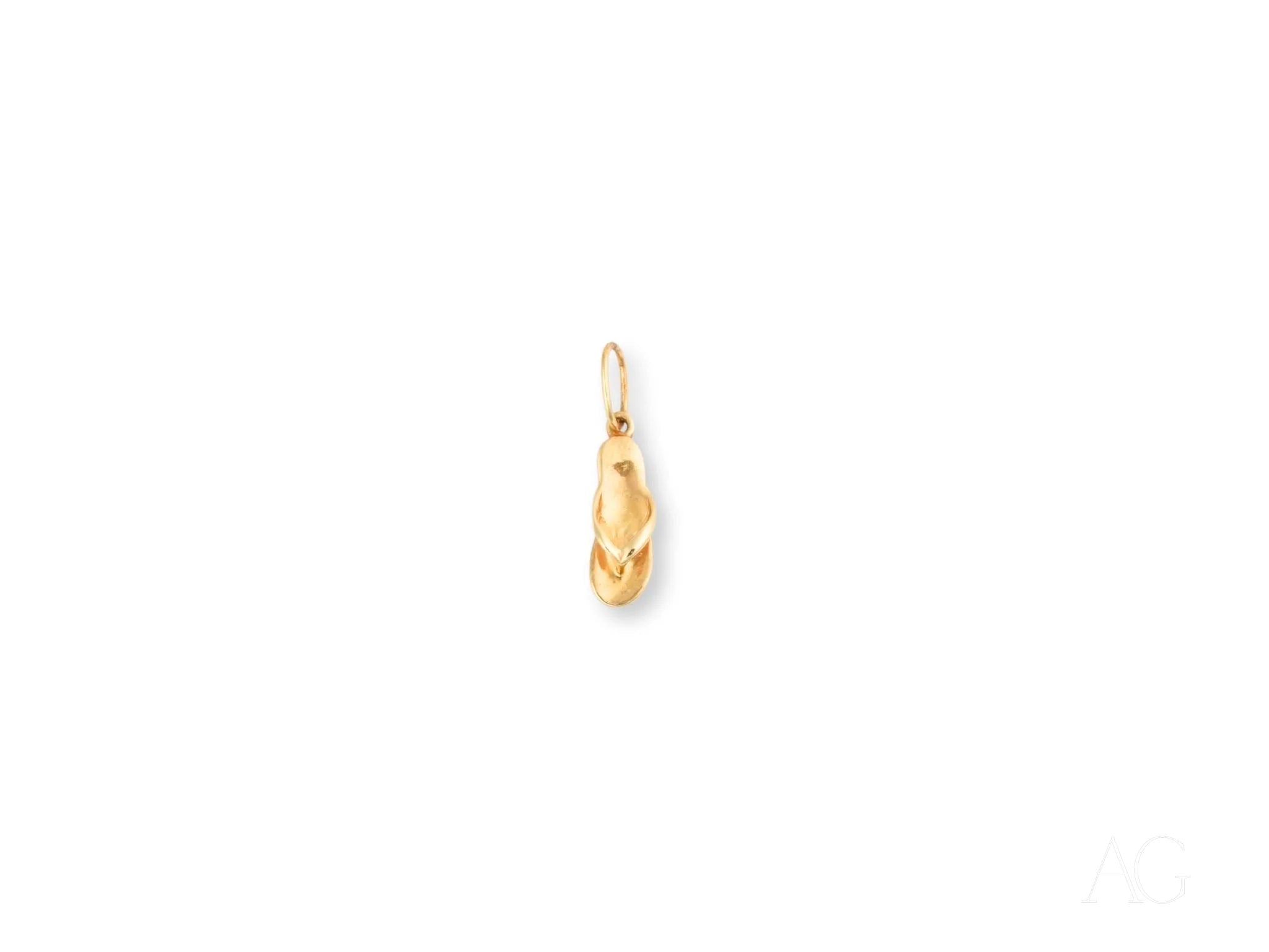 Gold ballet slipper charm featured in a stunning 18k Gold Golden Flip Flop Pendant