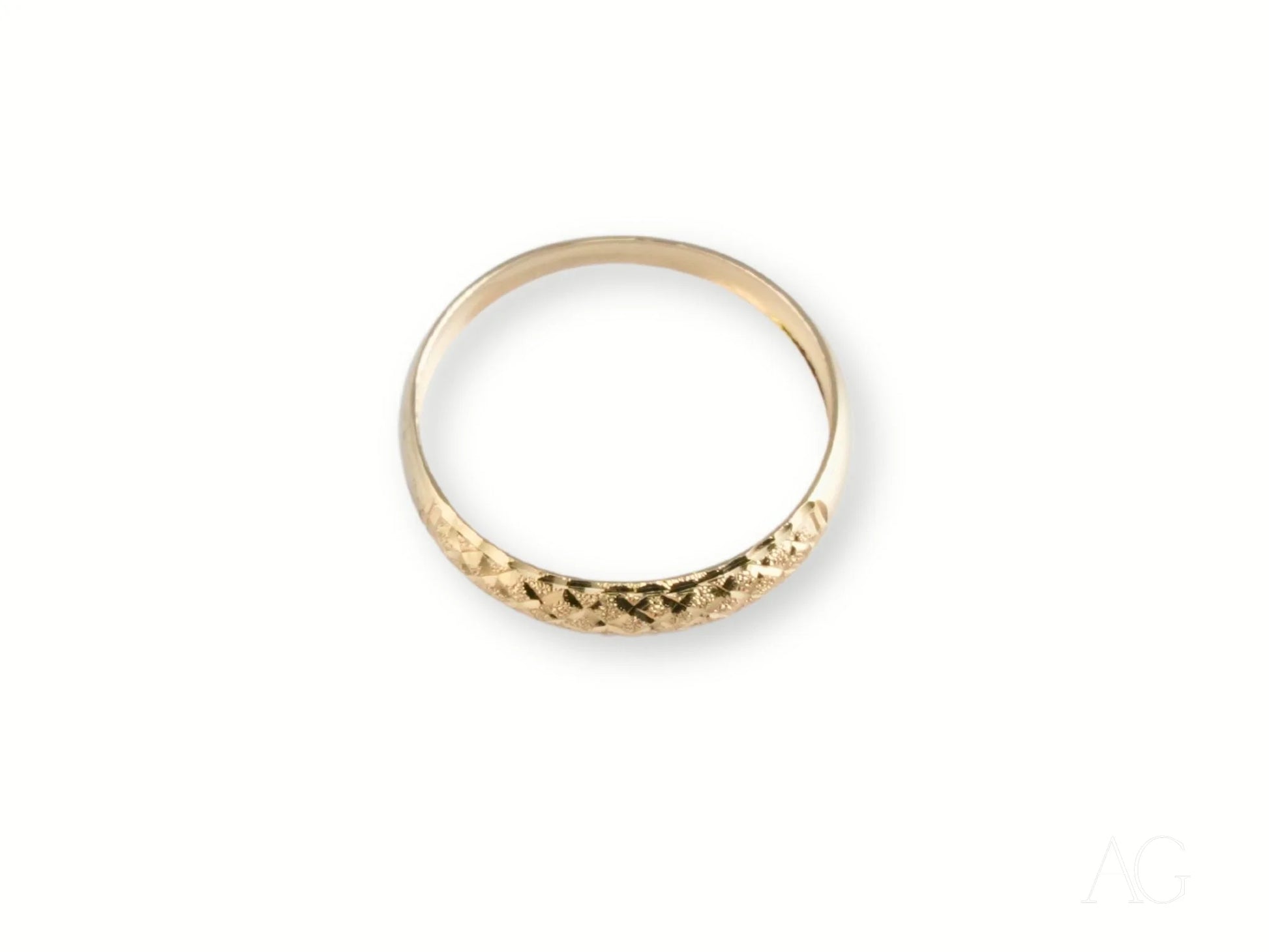 Gold ring with textured diamond pattern from the Golden Grace 18k Aparador Ring