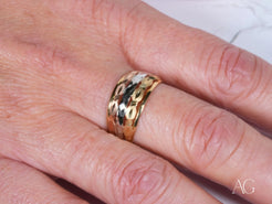 Gold ring with a textured design from the Golden Spectrum 18k gold collection