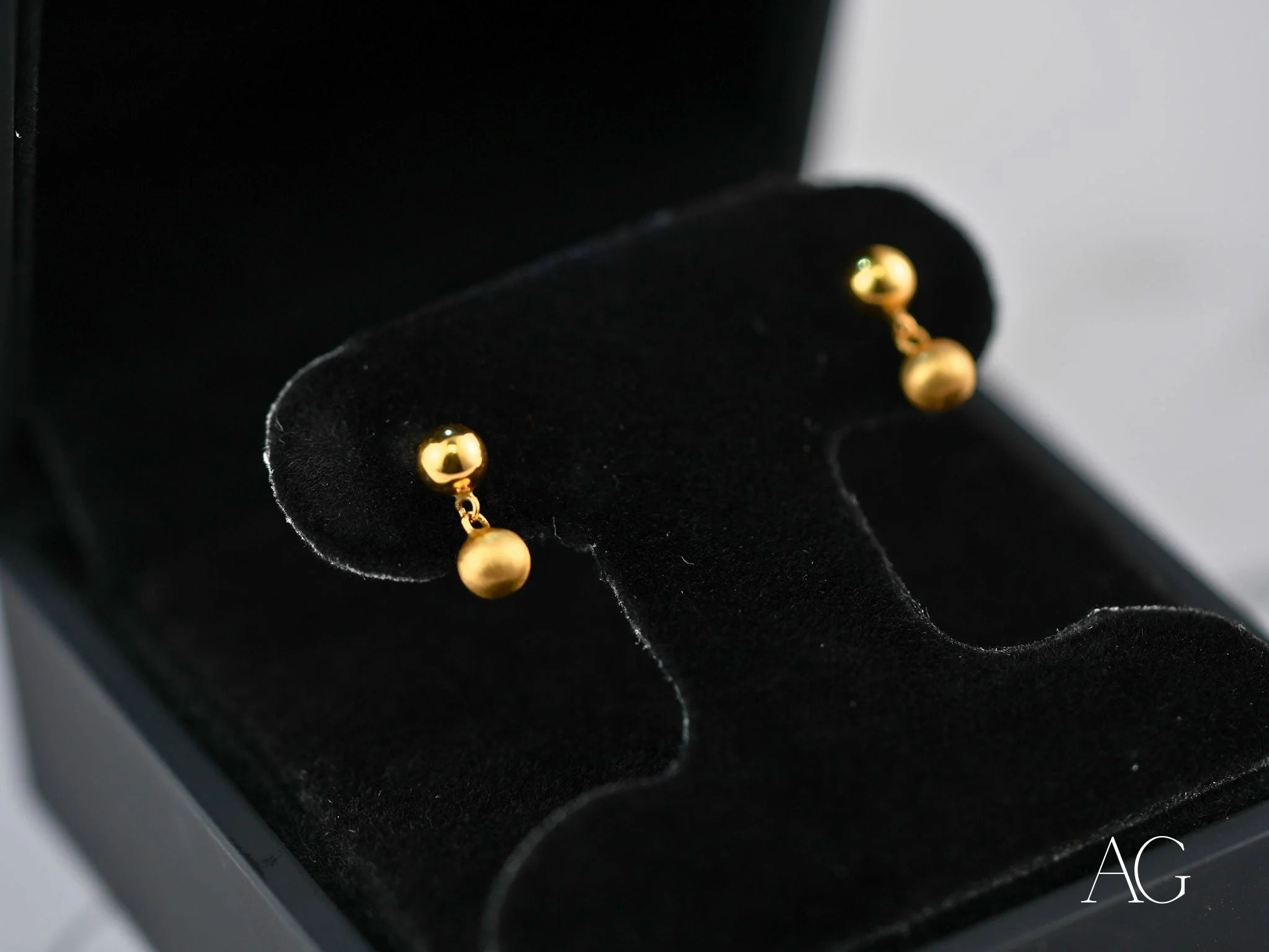 Elegant 18k Gold Ball Drop Earrings in a brushed gold finish, perfect for any occasion